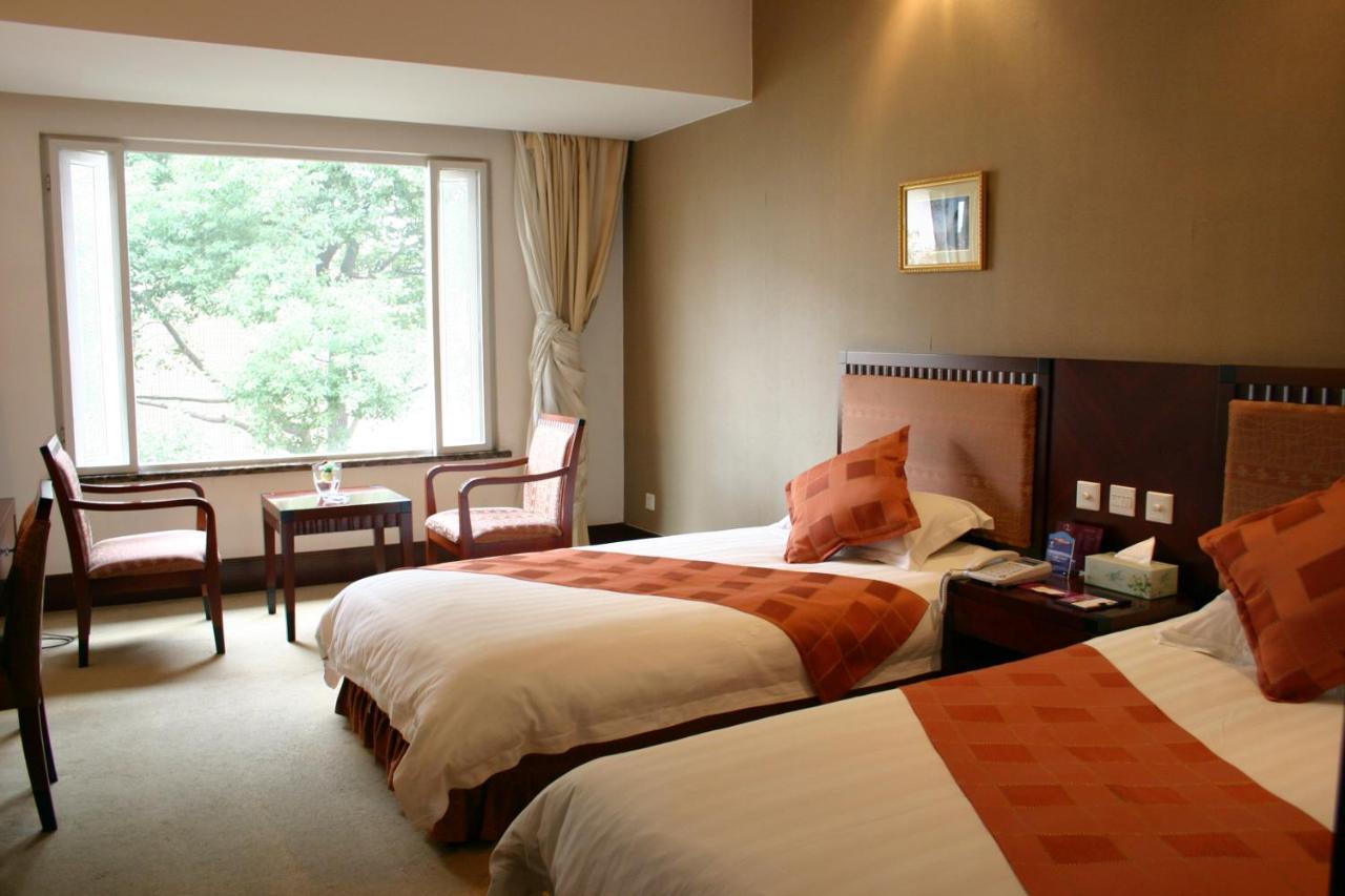 Suzhou Taoyuan International Holiday Hotel Szoba fotó